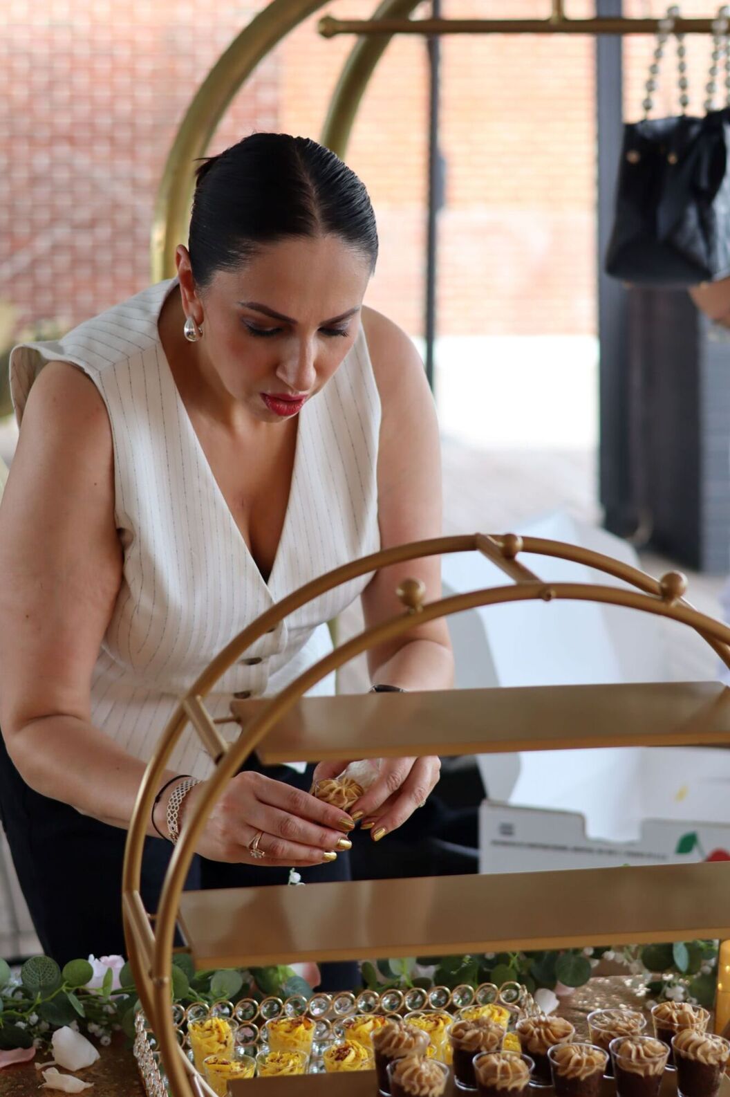 Neelma setting up the desseret table